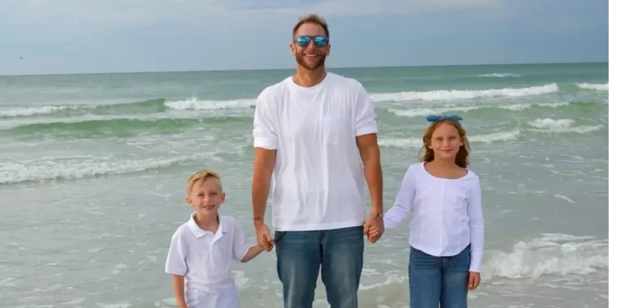 Will with his children at the beach